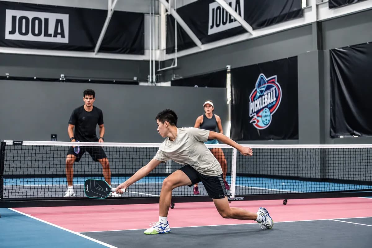 Players rallying at the net at Rockland Pickleball Club